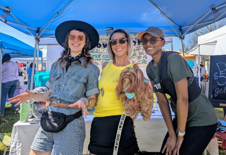 3 meowWOOF members and a small tan fluffy dog 